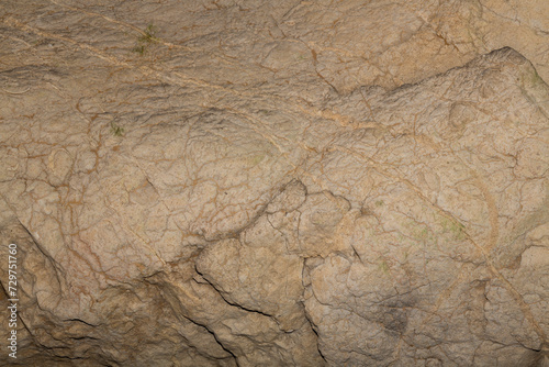 Speleology. Stone background abstract surface. The Bacho Kiro cave, Dryanovo, Bulgaria.