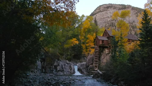 Colorado Crystal Mill historic landmark waterfall Crystal River Marble sunset autumn fall aerial drone cinematic golden hour Carbondale Telluride Aspen Pitkin Gunnison county backwards slowly motion photo