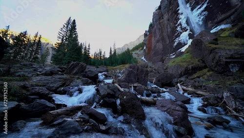 Bridal Veil Falls Telluride Colorado sunset stream frozen ice Waterfall fall autumn orange peaceful sunset cool shaded Rocky Mountains Silverton Ouray historic town scenic landscape slow pan wide photo