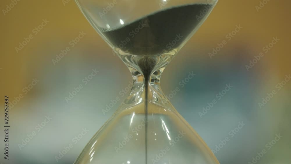 Macro close up video of sand timer running down