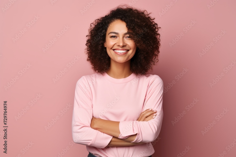 Portrait of happy young african american woman with folded arms Portrait of happy young african american woman with folded arms
