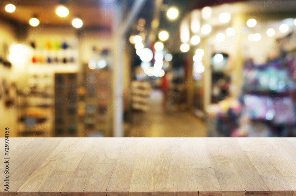 Empty dark wooden table in front of abstract blurred boken bankground of restaurant. Can used for display or montage your products. Mock up for space. Empty dark wooden table in front of abstract blurred boken bankground of restaurant. Can used for display or montage your products. Mock up for space.