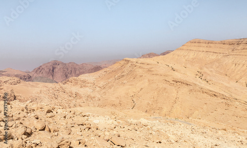 View of low mountains in the gorge Wadi Al Ghuwayr or An Nakhil and the wadi Al Dathneh from the road leading to it near Amman in Jordan