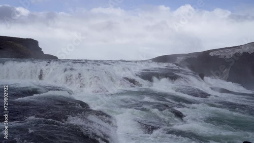 Wallpaper Mural Majestic Gullfoss waterfall in Iceland with misty spray, cloudy skies Torontodigital.ca