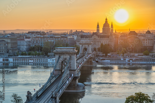 Budapest Hungary, sunrise city skyline at Danube River with Chain Bridge and St. Stephen's Basilica photo