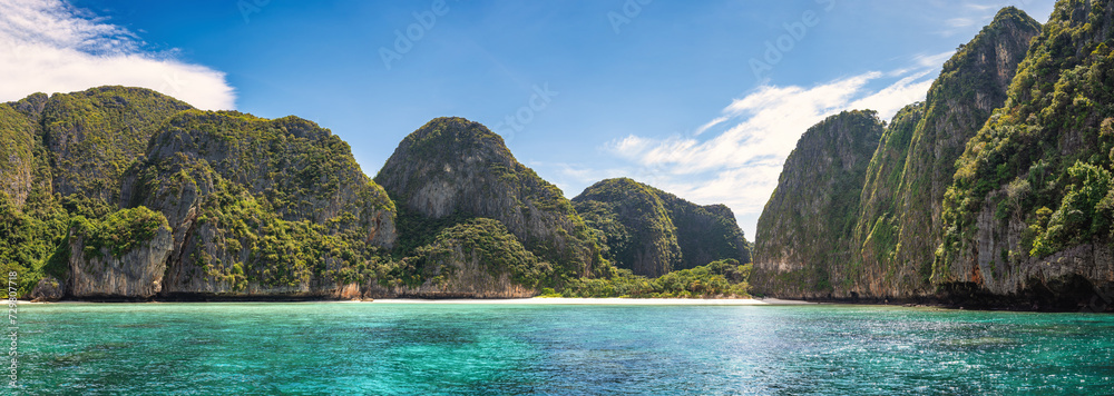 Tropical islands view with ocean blue sea water and white sand beach at Maya Bay of Phi Phi Islands, Krabi Thailand nature landscape panorama
