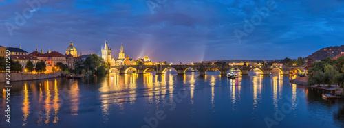 Prague Czechia Czech Republic, panorama night city skyline at Charles Bridge and Prague old town © Noppasinw
