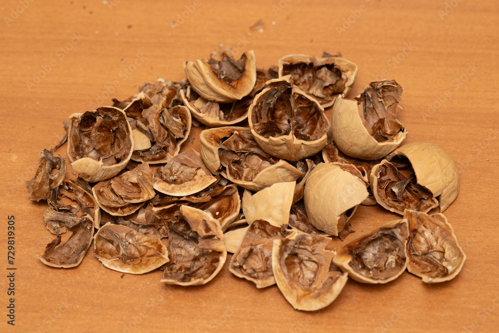Walnuts, shell tongs on the table. Walnuts, shell tongs on the table.