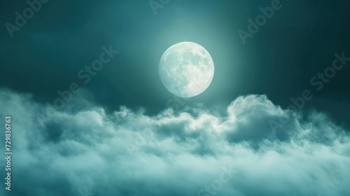  a full moon rising above the clouds in the night sky with a dark blue sky and a few white clouds in the foreground, and a dark blue sky with a few white clouds.