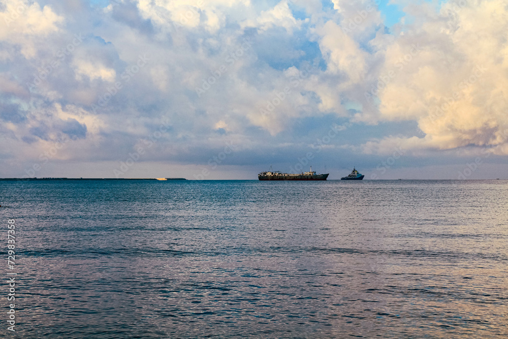 Sea landscape with large steamers or merchant ships on the horizon,Sanya,Hainan Province,China.