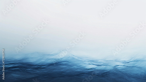 A serene and minimalist abstract background, capturing the calm and misty essence of a vast ocean expanse in shades of blue. © eaglesky