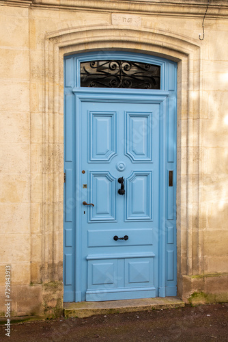 Blue French door wooden traditional european entrance to a private house in the City Center © OceanProd