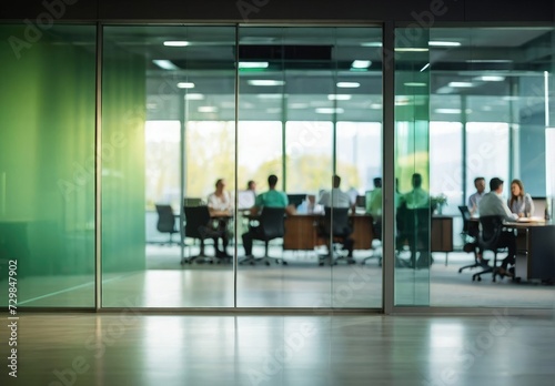 Modern Business Office Corridor with Colleagues in Blurred Suits in Office