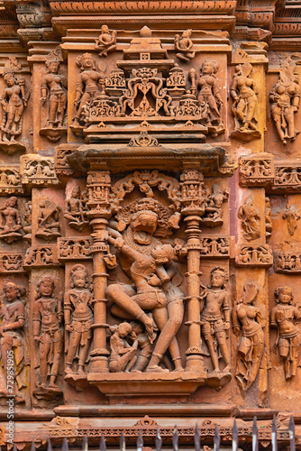 Carvings of Lord Narshimha With Lakshmi on the Sun Temple of Jhalarapatan, Rajasthan, India. photo