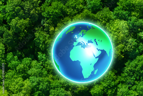 Earth. planet earth against a background of green forest, close-up. nature protection concept