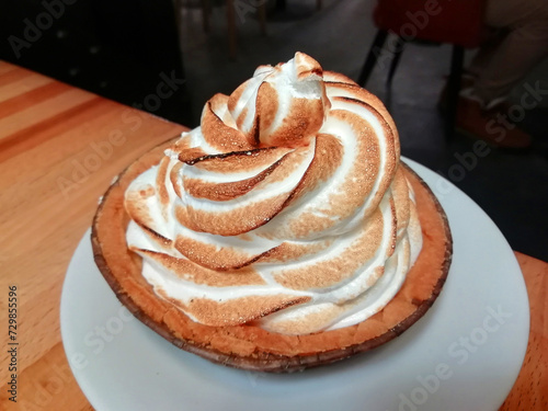 Delicious vanilla cupcake with cream cheese on a gray background. Dessert for birthday.  copy space