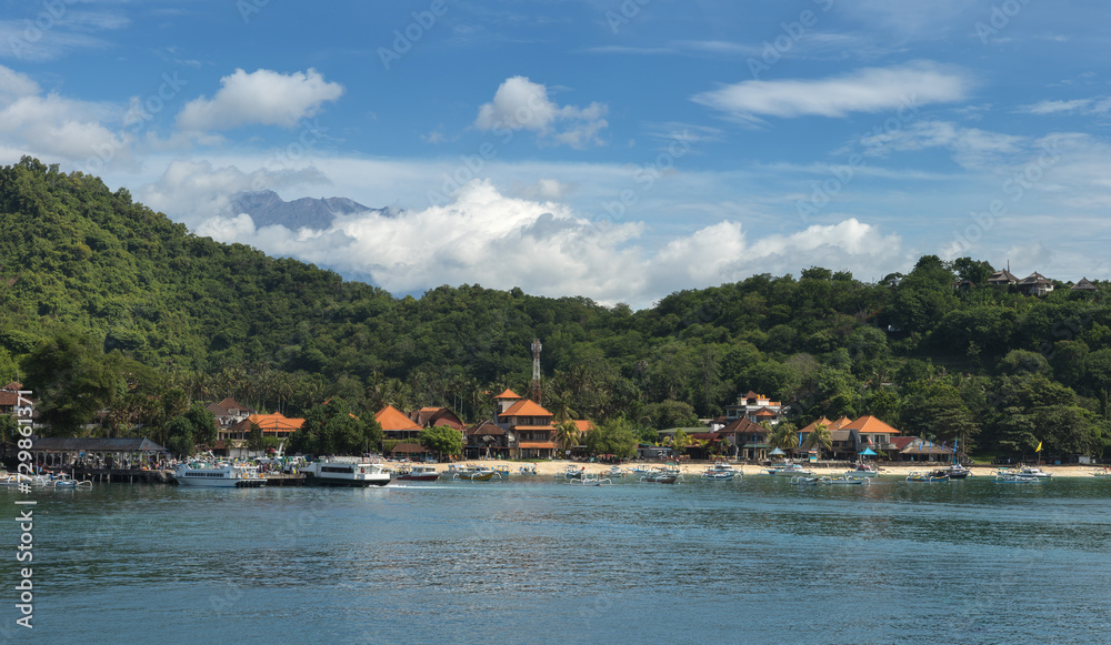 Fototapeta premium Padang Bai bay, green hills and turquoise water on a tropical Bali island