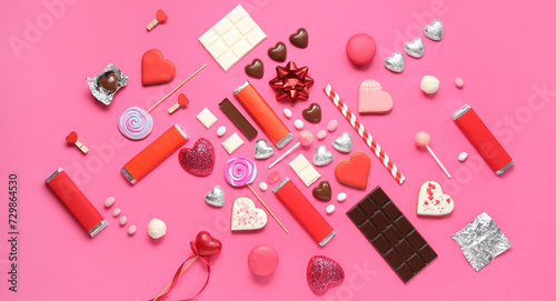 Many different tasty sweets on pink background. Valentine's Day celebration