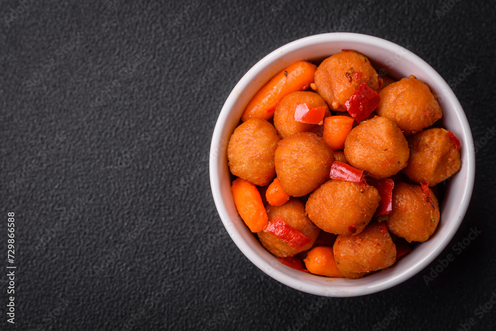 Delicious fried potato balls with vegetables, salt, spices and herbs Delicious fried potato balls with vegetables, salt, spices and herbs