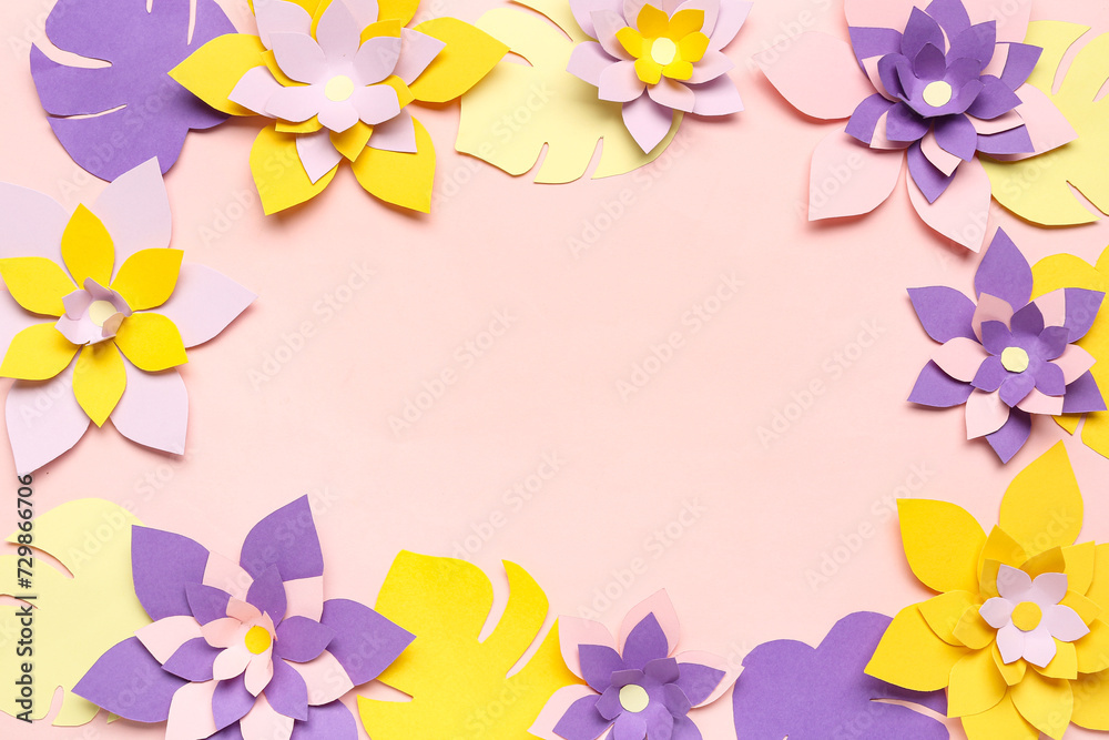 Frame made of colorful origami flowers with leaves on pink background