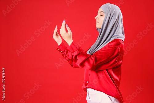 Young Muslim woman in hijab...