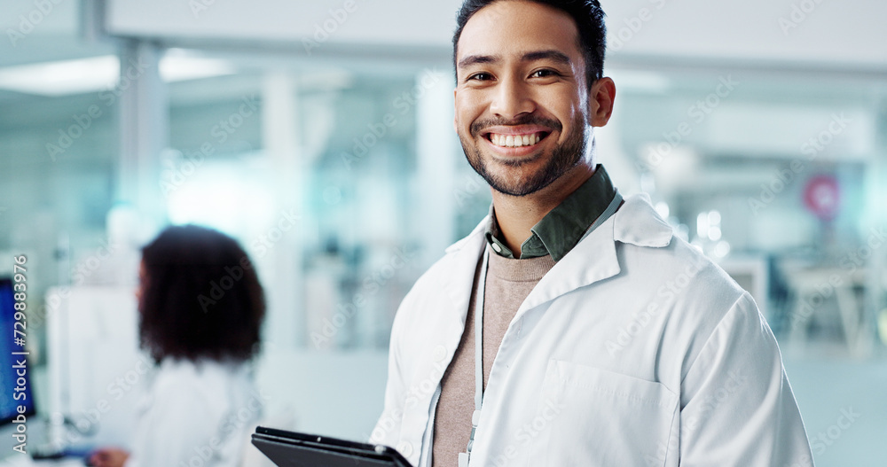 Man, face and scientist with tablet in laboratory and online research of genetics specialist in healthcare. Asian doctor, portrait and happy at work in pharmaceutical career and working on innovation - obrazy, fototapety, plakaty 