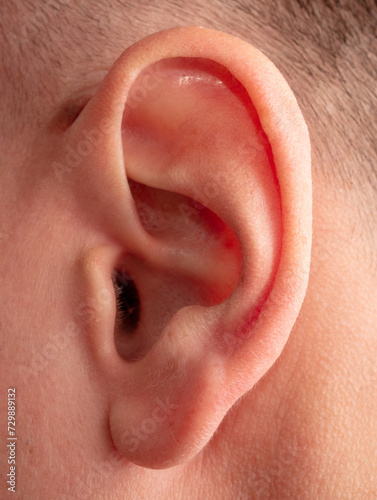 Close-up of a man's ear. Macro