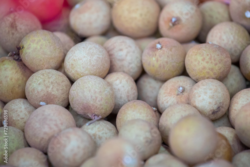 Stack pile of fresh fruit longan. Close up for background