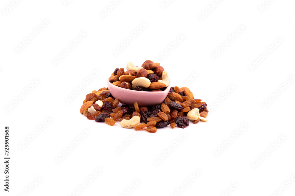raw nuts on a white background. raw nuts in heart shaped bowl raw nuts on a white background. raw nuts in heart shaped bowl