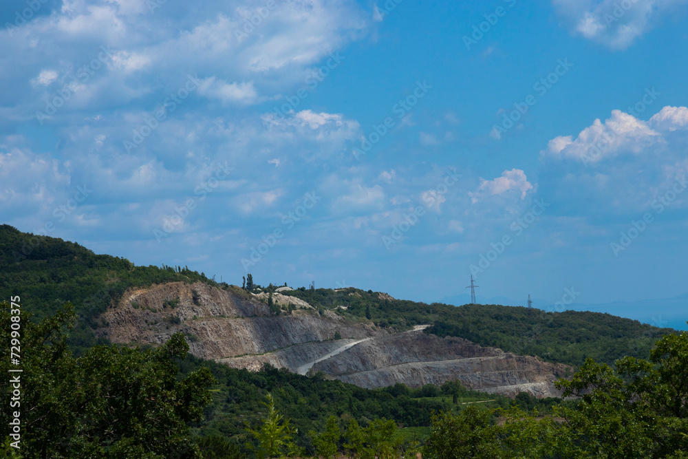 Mining mine, open pit for the extraction of minerals. Selective focus.