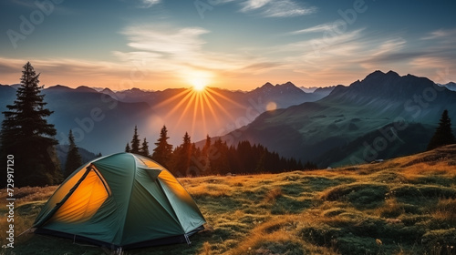 Camping tent high in the mountains. tourist tent camping in mountains at sunset photo