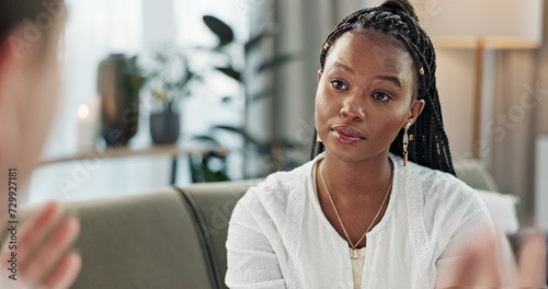 Psychology, mental health and empathy with a black woman therapist talking to a patient in her office. Support, consulting and trauma with a young psychologist listening to a client in grief therapy
