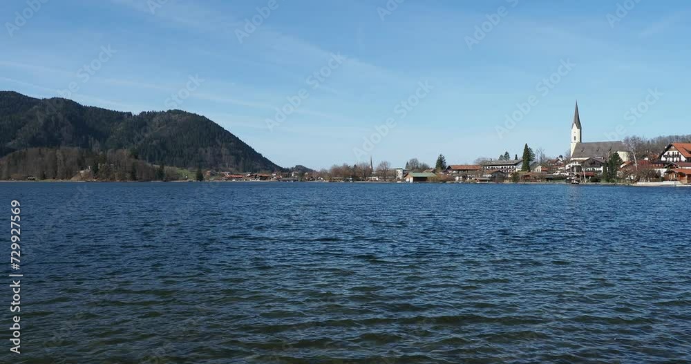 Landscapes of the Bavarian Alps. The town of Schliersee and Saint Sixtus Church along the northern shore of the lake in front of Freudenberg at the end of the western shore Landscapes of the Bavarian Alps. The town of Schliersee and Saint Sixtus Church along the northern shore of the lake in front of Freudenberg at the end of the western shore