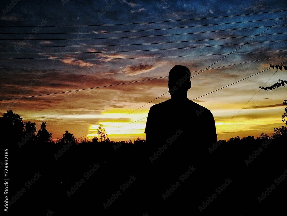 Fototapeta premium silhouette people standing alone