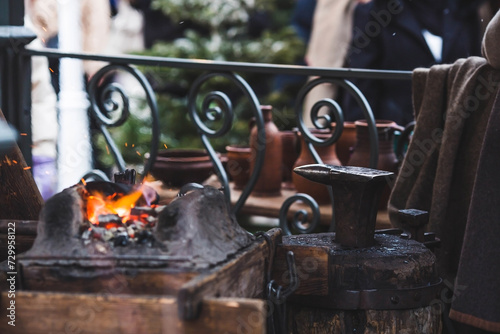 Moscow seasons. A traditional craft. Blacksmith's work with metal. Hammer and anvil. Russian traditions. Moscow. Russia
