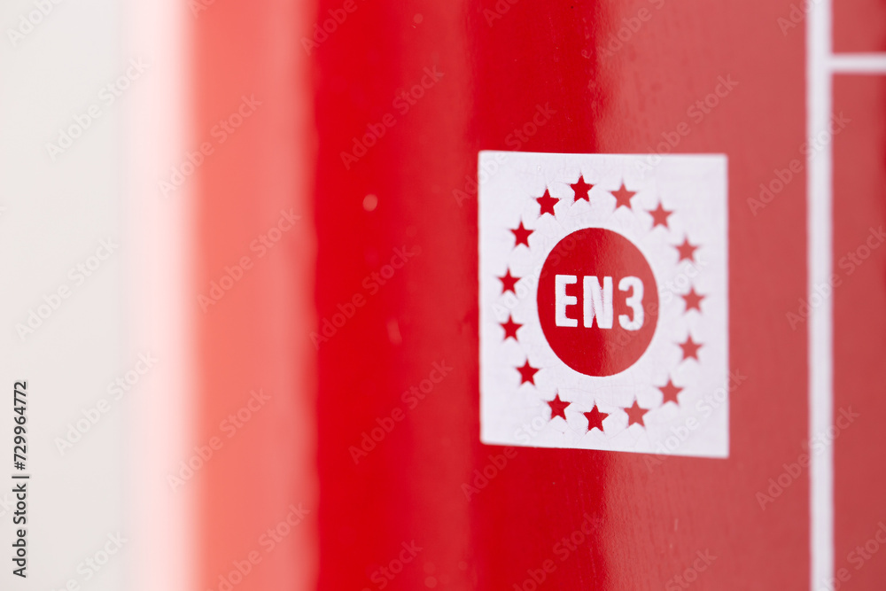 Foto de closeup of a marking on a fire extinguisher that complies with ...