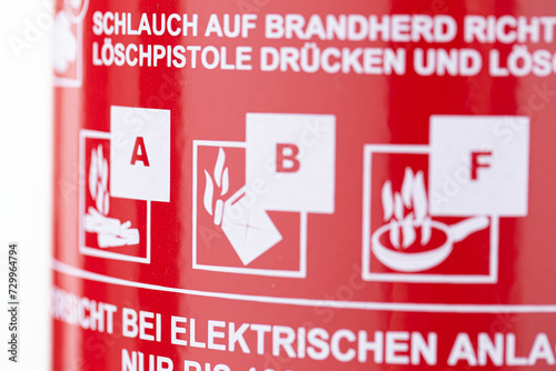 closeup of a german fire extinguisher, showing the applicable fire classes of a foam fire drencher