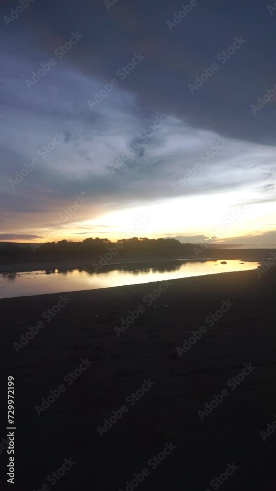 beautiful view of the sunrise on the beach with small waves, morning natural panorama on Karang Paranje beach, Garut beautiful view of the sunrise on the beach with small waves, morning natural panorama on Karang Paranje beach, Garut