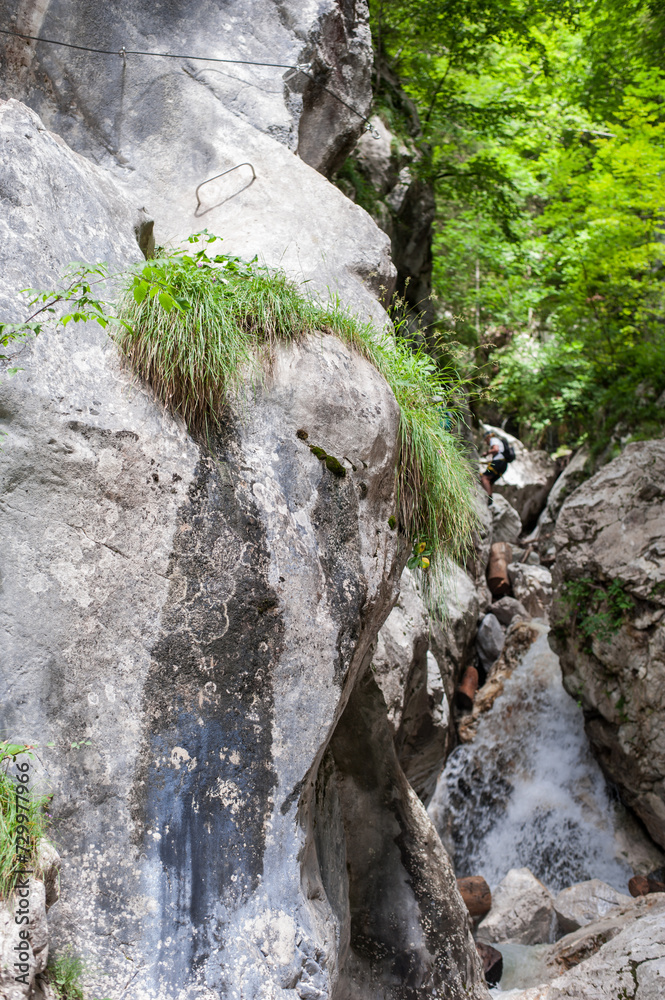 Obraz premium climbers in full equipment climb Slovenian ferrates