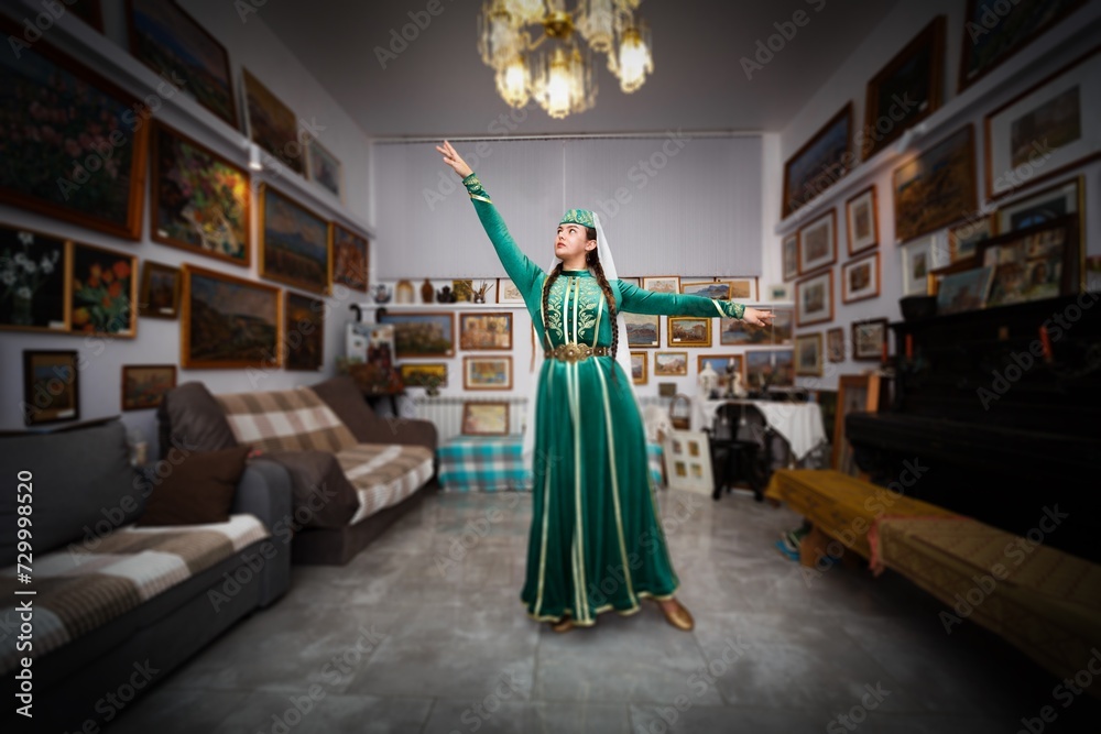 Portrait of a young happy beautiful Muslim woman dancing Portrait of a young happy beautiful Muslim woman dancing