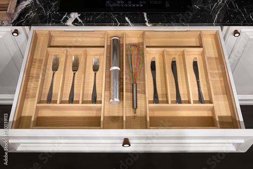 Wood kitchen drawer organizer, utensil holder with simple set of kitchen tools, furniture details