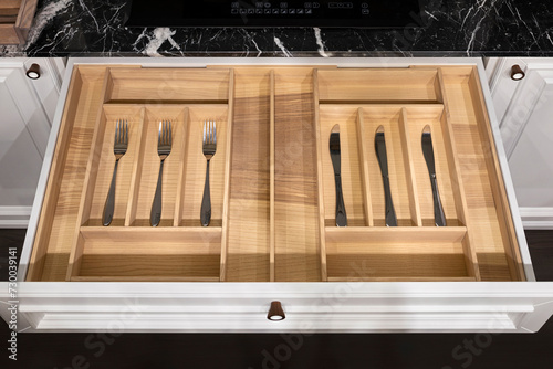 Wood kitchen drawer organizer, utensil holder with simple set of kitchen tools, furniture details