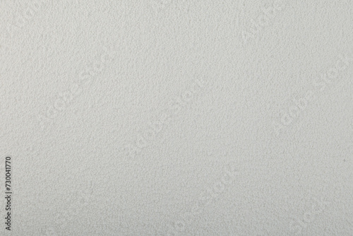 Texture of Sodium percarbonate or sodium carbonate peroxide, close-up. White granulated powder. Chemical substance with formula Na2H3CO6 used in eco-friendly bleaches and other cleaning products photo