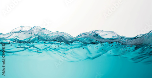 Split underwater photo at the surface of turbulent turquoise sea water. White background.