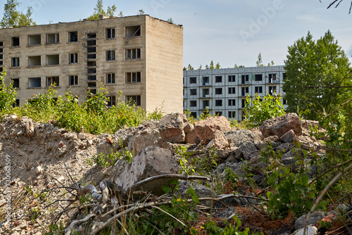 abandoned old soviet union city Irbene, ruined houses photo