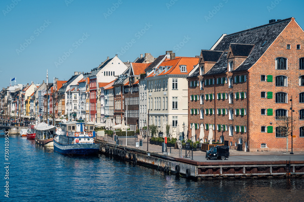 Famous old Nyhavn harbor with colorful houses in the center of Copenhagen, Denmark.