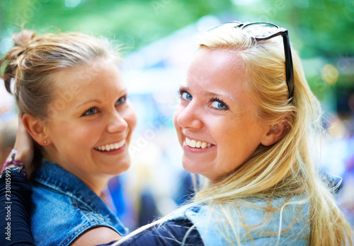 Portrait, girls and happy friends at music festival outdoor, event or bonding at concert. Face, sunglasses or women together at party for celebration, carnival or smile of people having fun in nature