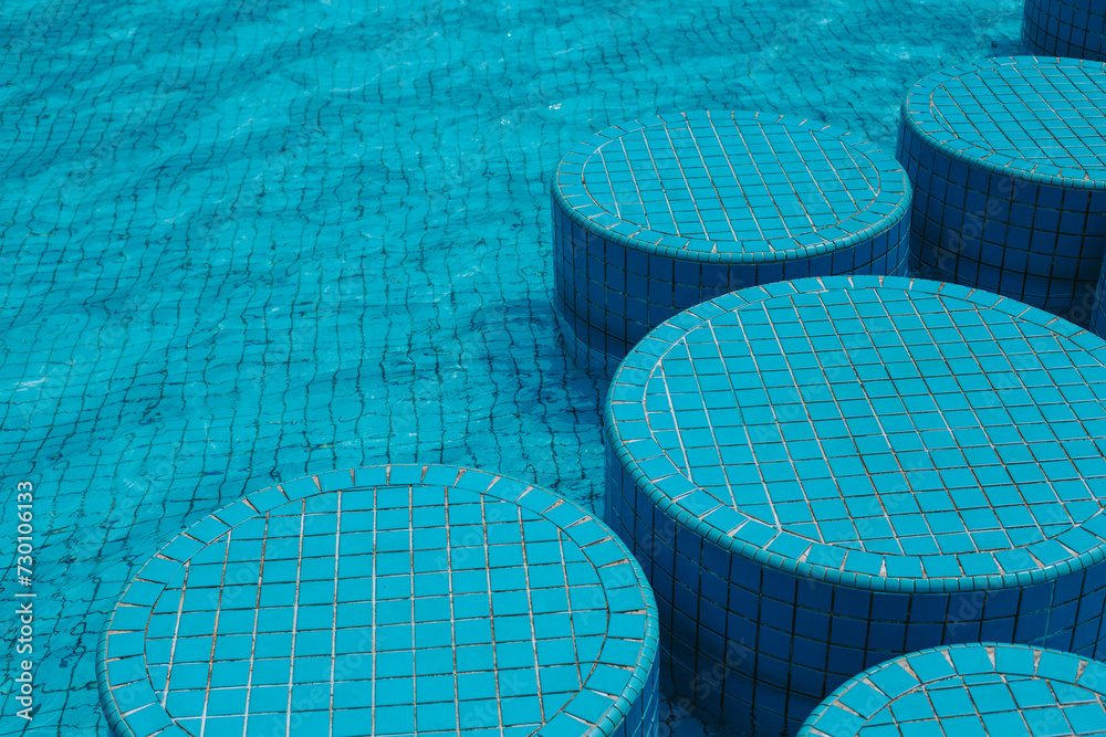 Corner steps in the blue pool
