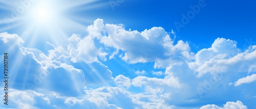 Summer weather / cloudscape landscape background banner - Blue sky with clouds and sun sunshine sunbeams sun rays photo