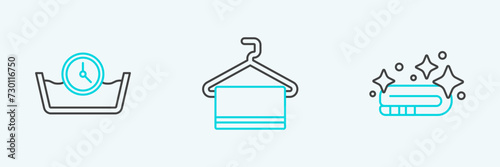 Set line Towel stack, Time wash and on hanger icon. Vector